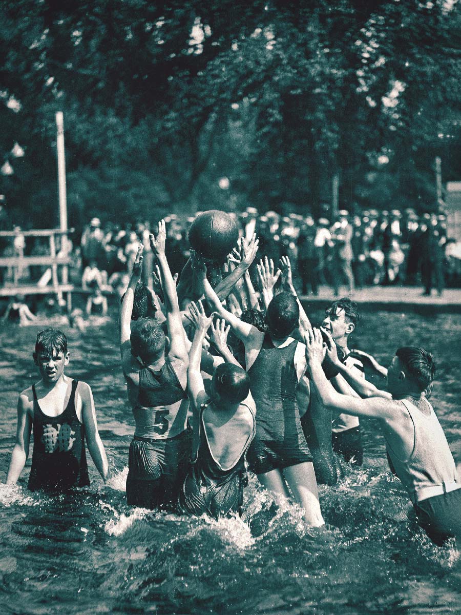 Boys Playing with Ball in Pool